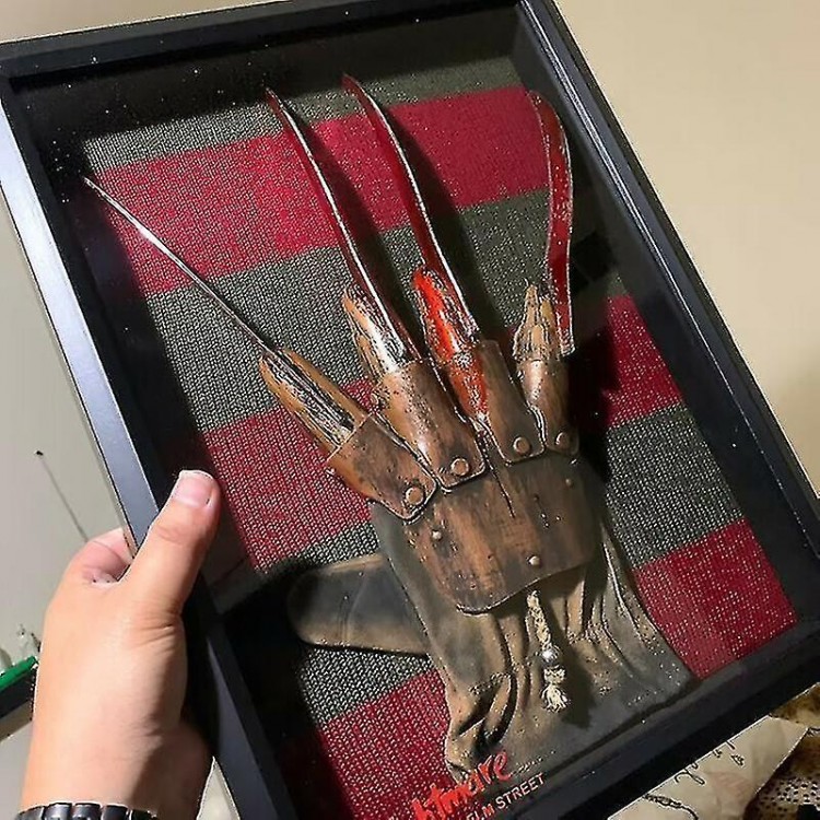 Nightmare Nostalgia: Freddy Krueger Glove and Sweater Display